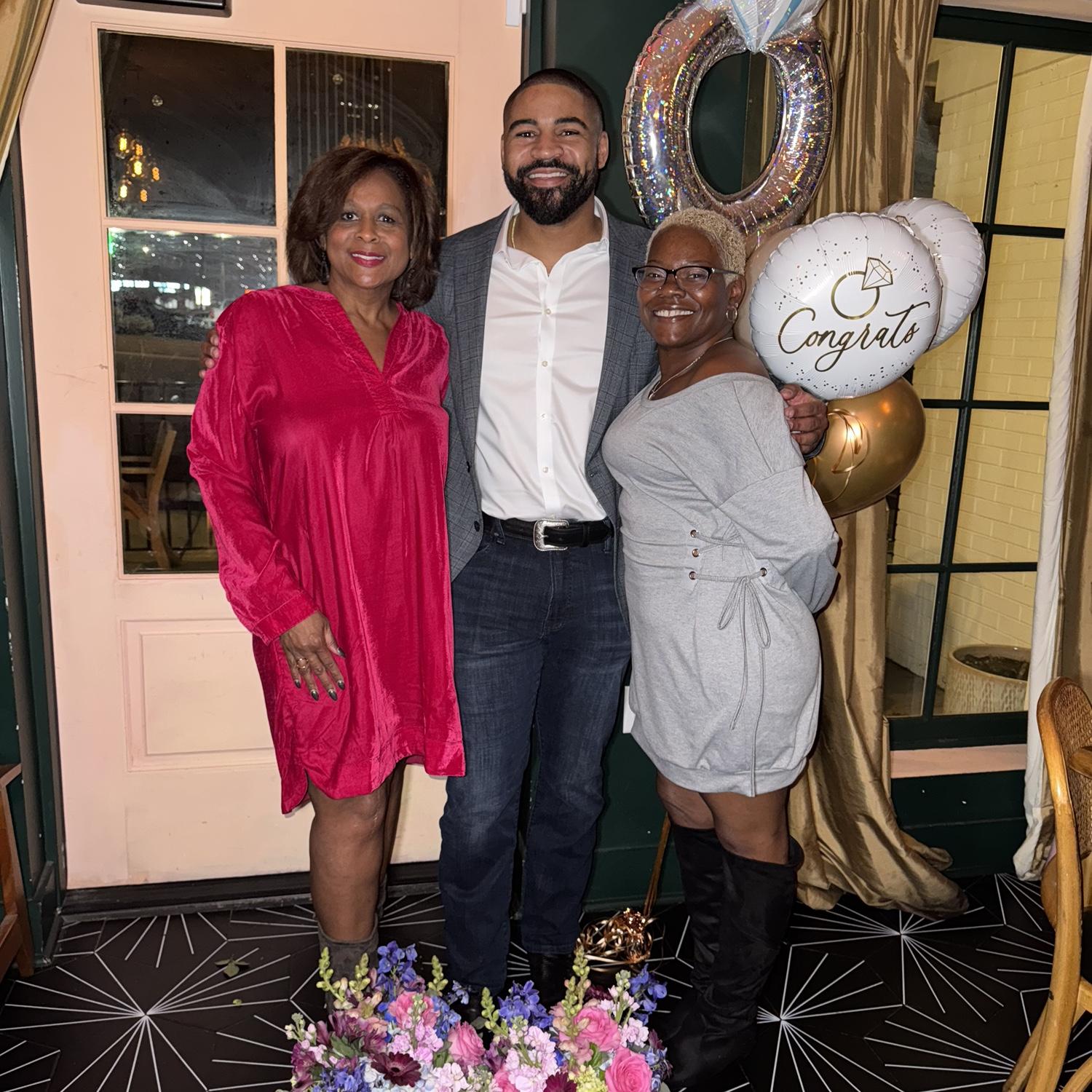 Celebrating our engagement! Carlton with his mother and Destiny’s mother.