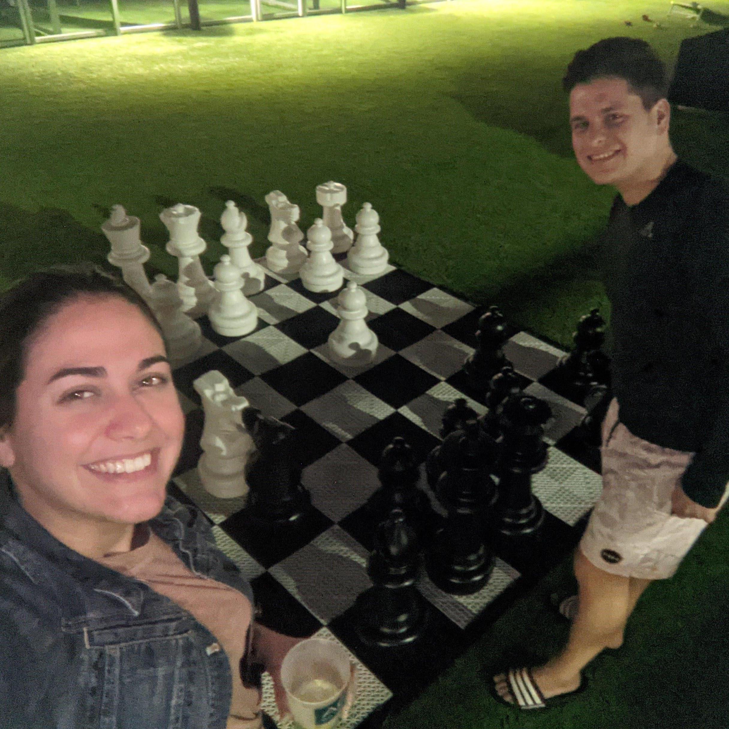 Aron teaching Laura Chess