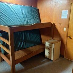 Bedrooom with bunkbeds inside "Upper Health House"