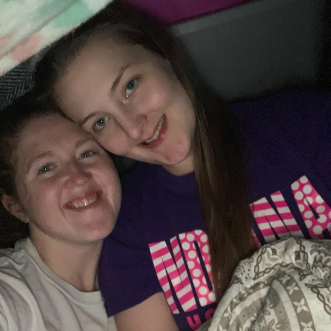 Yes, we are grown adults enjoying a perfectly constructed blanket fort!