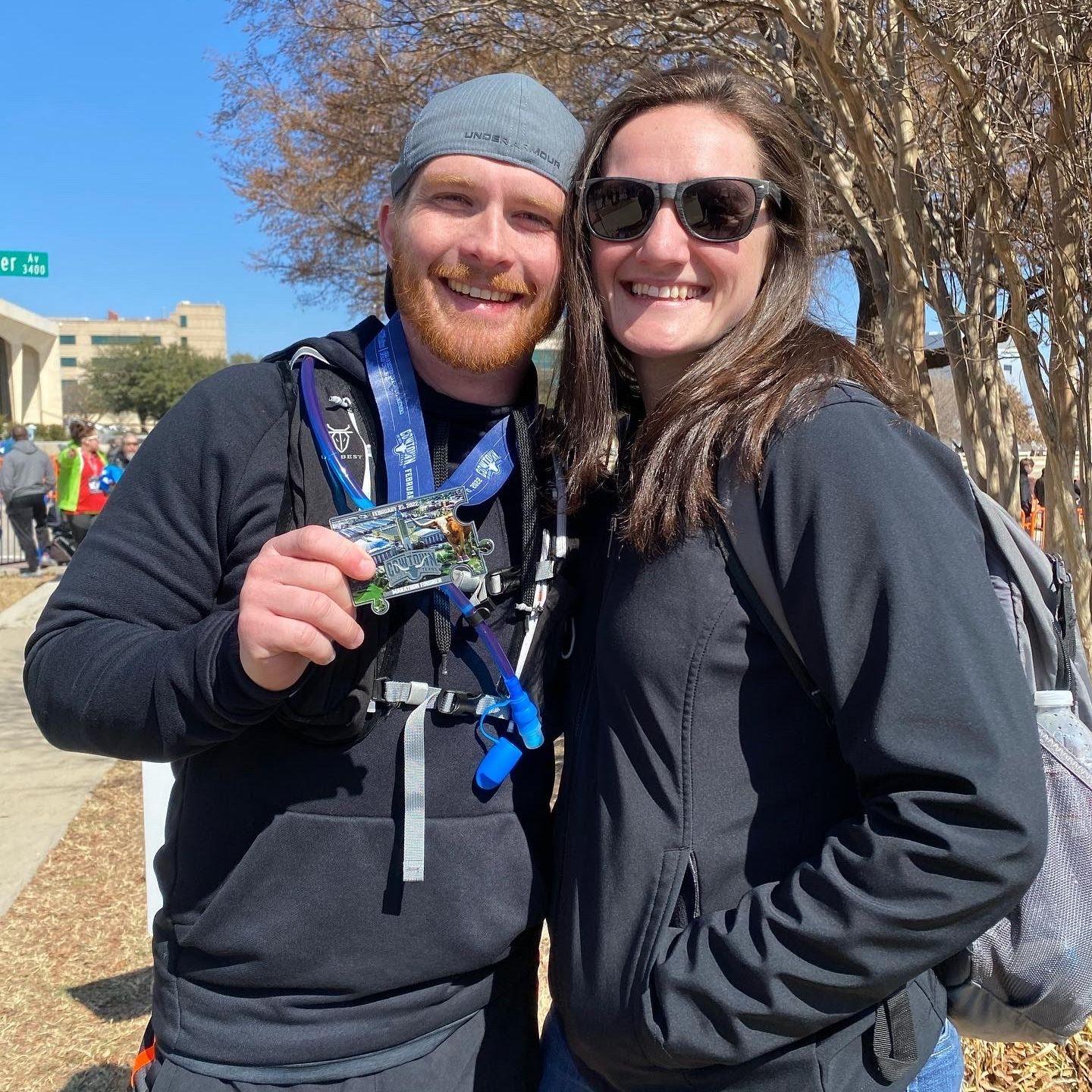 He ran a marathon. I walked half. Neither one of us knows how we're still standing for this photo