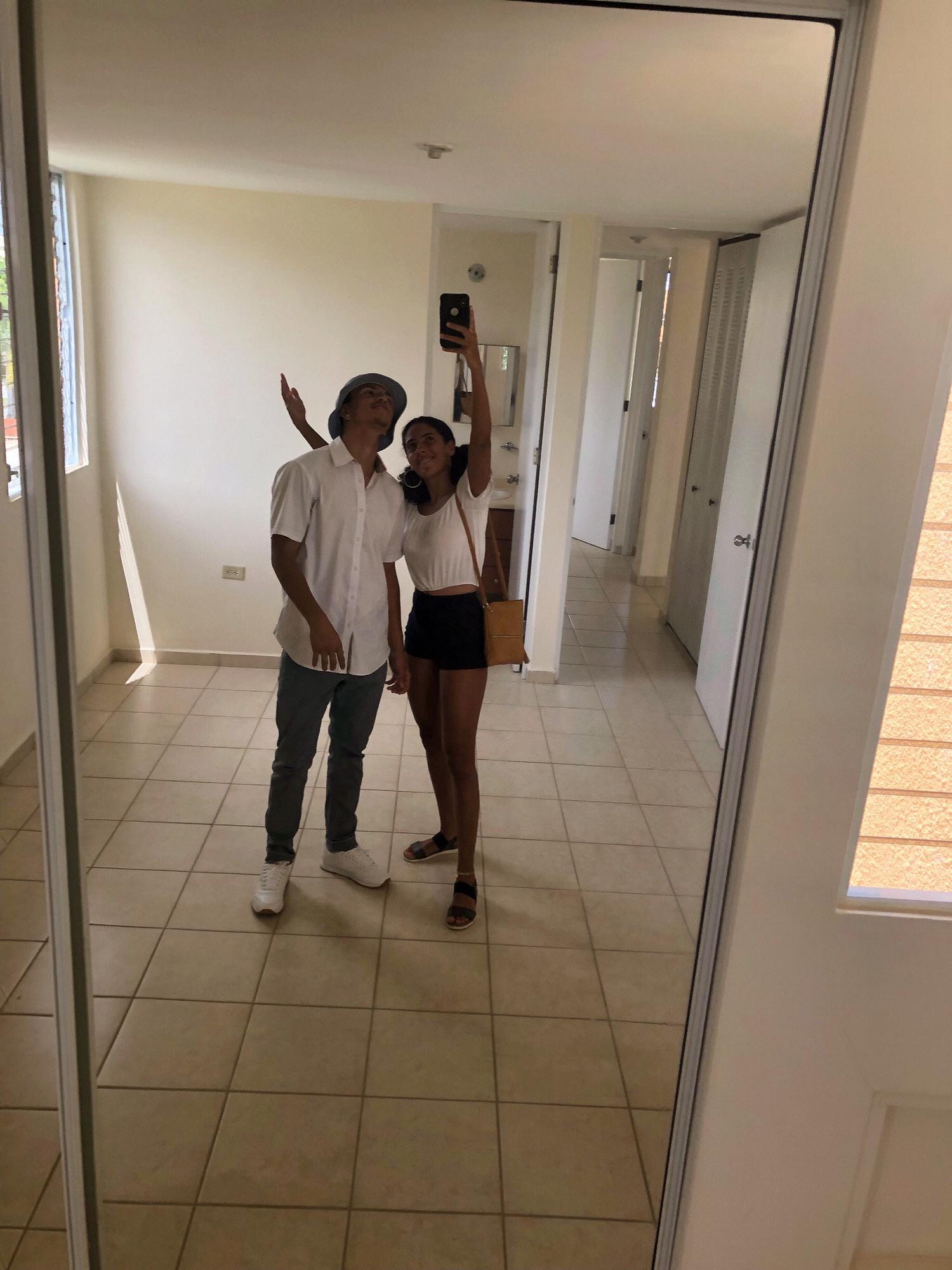 "Helping" Griselys parents look for apartments in Puerto Rico.