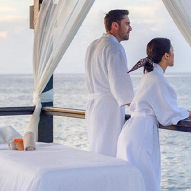 Beachside couples massage on our honeymoon