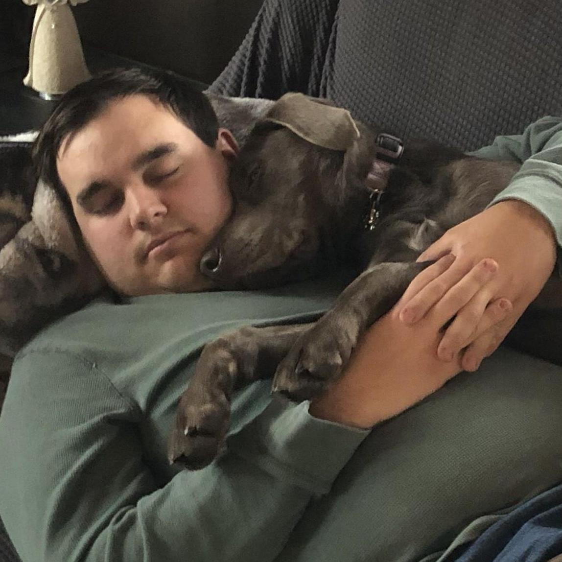 Chloe loves snuggling up for a nap with Tanner!