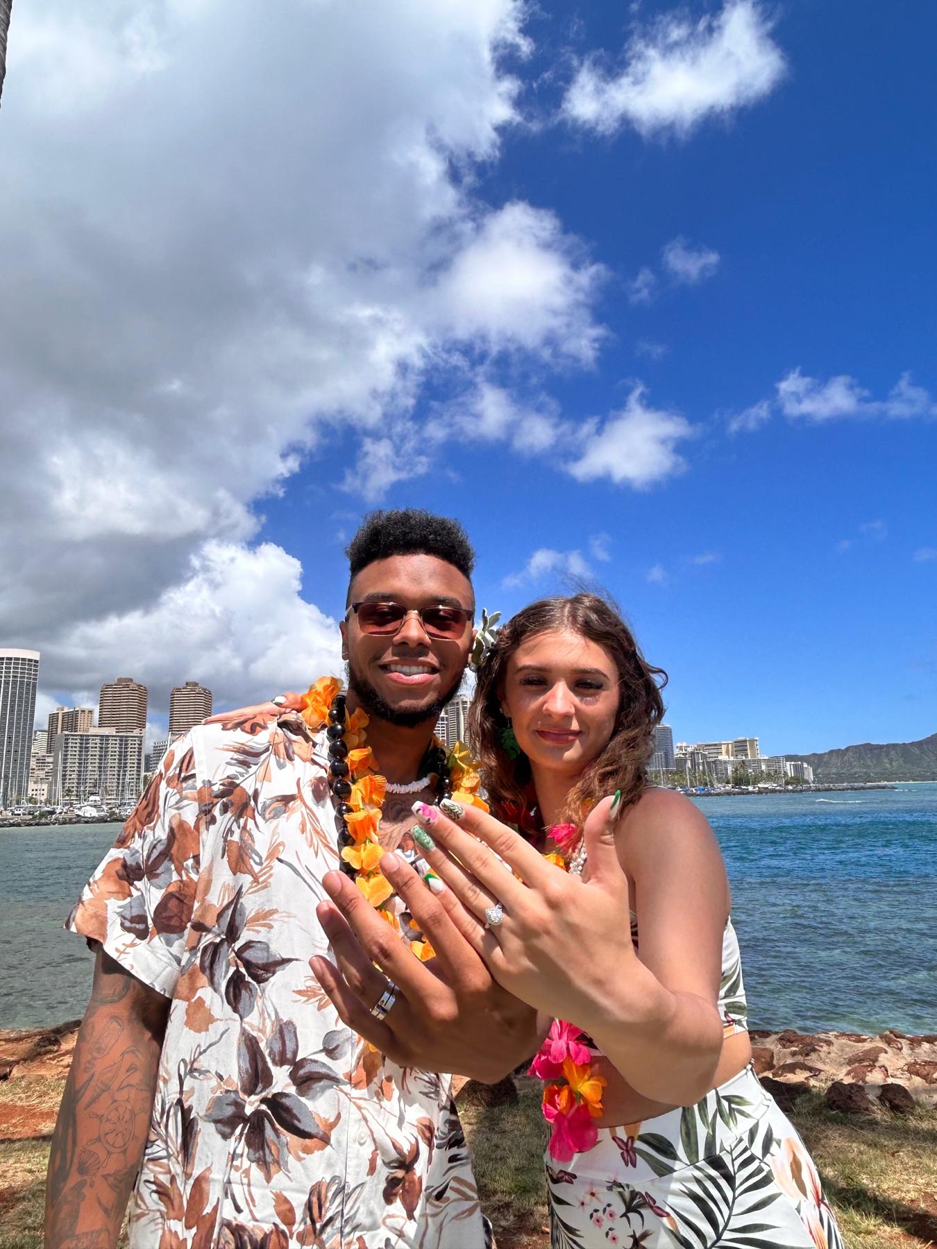 This is us on magic island in hawaii, where we got eloped and it was beautiful! 🌺