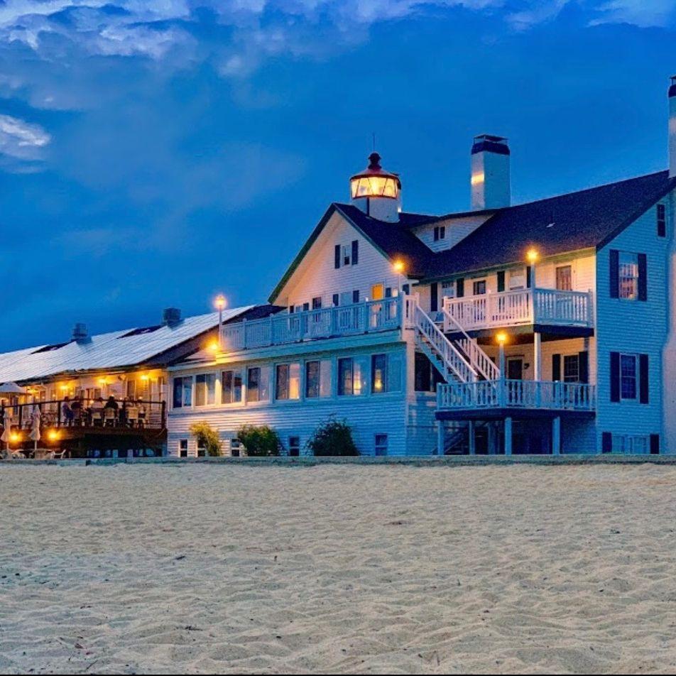 View of Lighthouse Inn from their private beach.