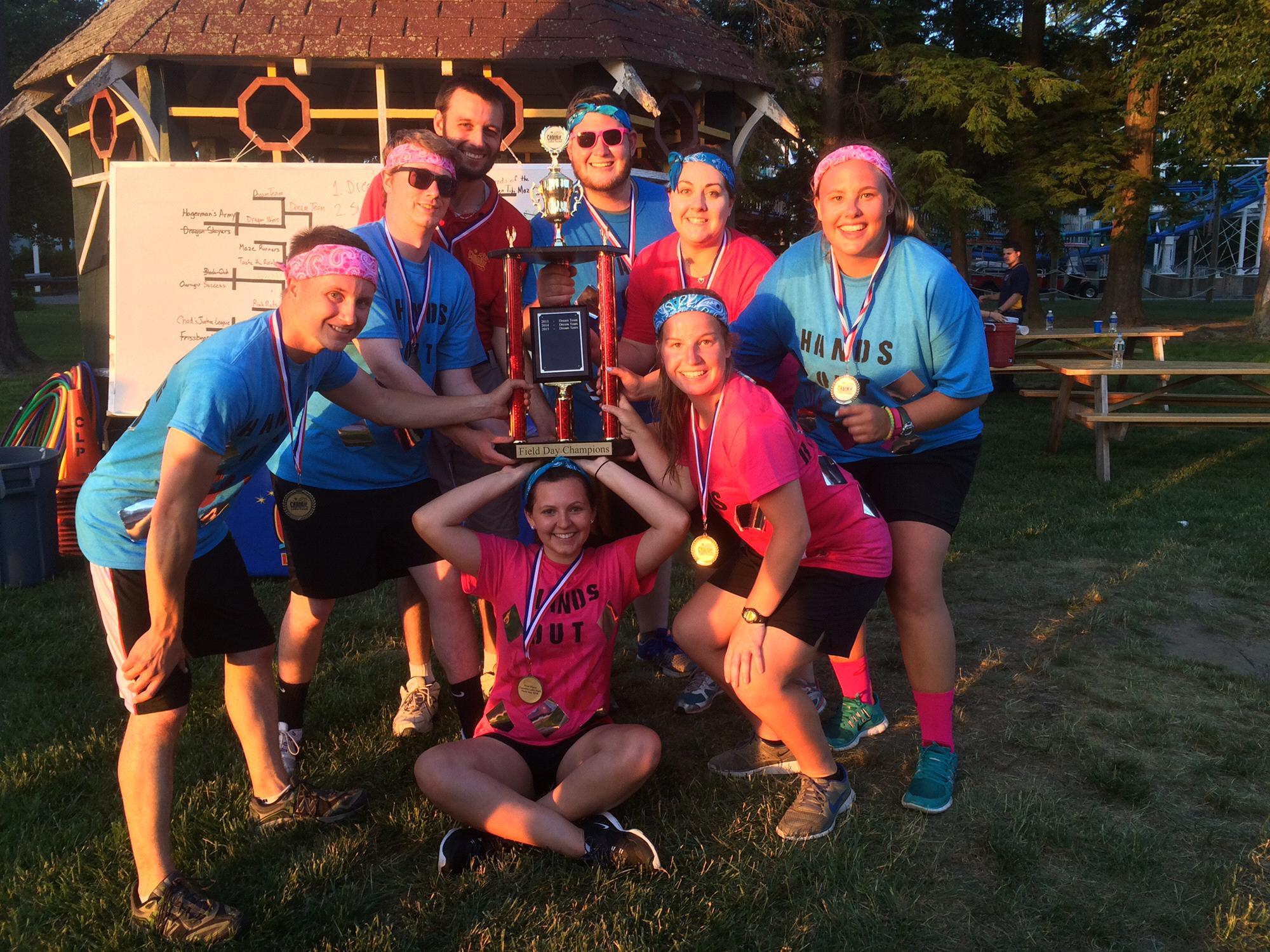 The winning field day team, featuring Liz, justin, steve, and avery. Hands out, no running.