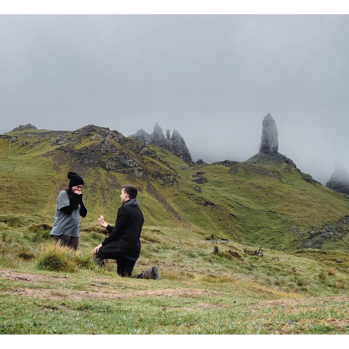 Aaron and Mia went abroad for the first time together to the United Kingdom. He proposed in the Scottish Highlands after we hiked to the Old Man of Storr.