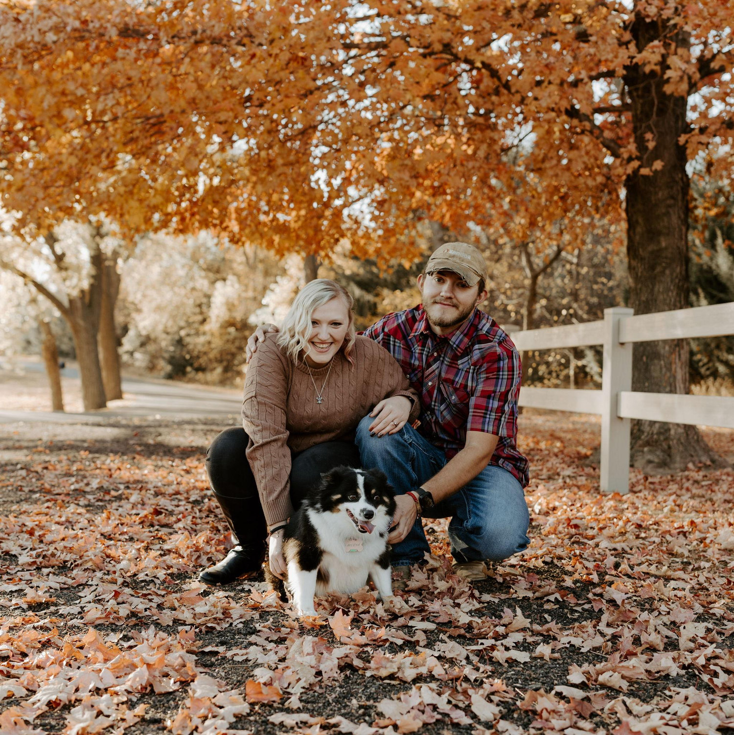 Taking pictures together as a family after engagement