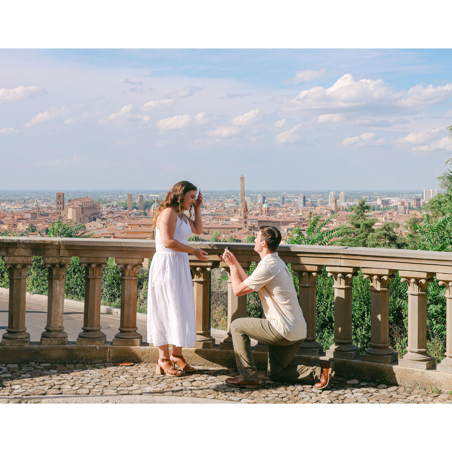 Surprise engagement overlooking Bologna, Italy