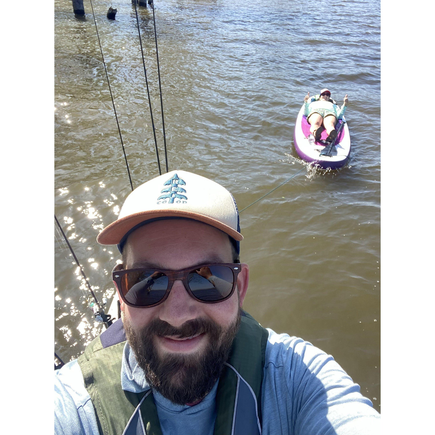 We figured out this was the best way to fish together. Scott tows Alana behind his kayak.
