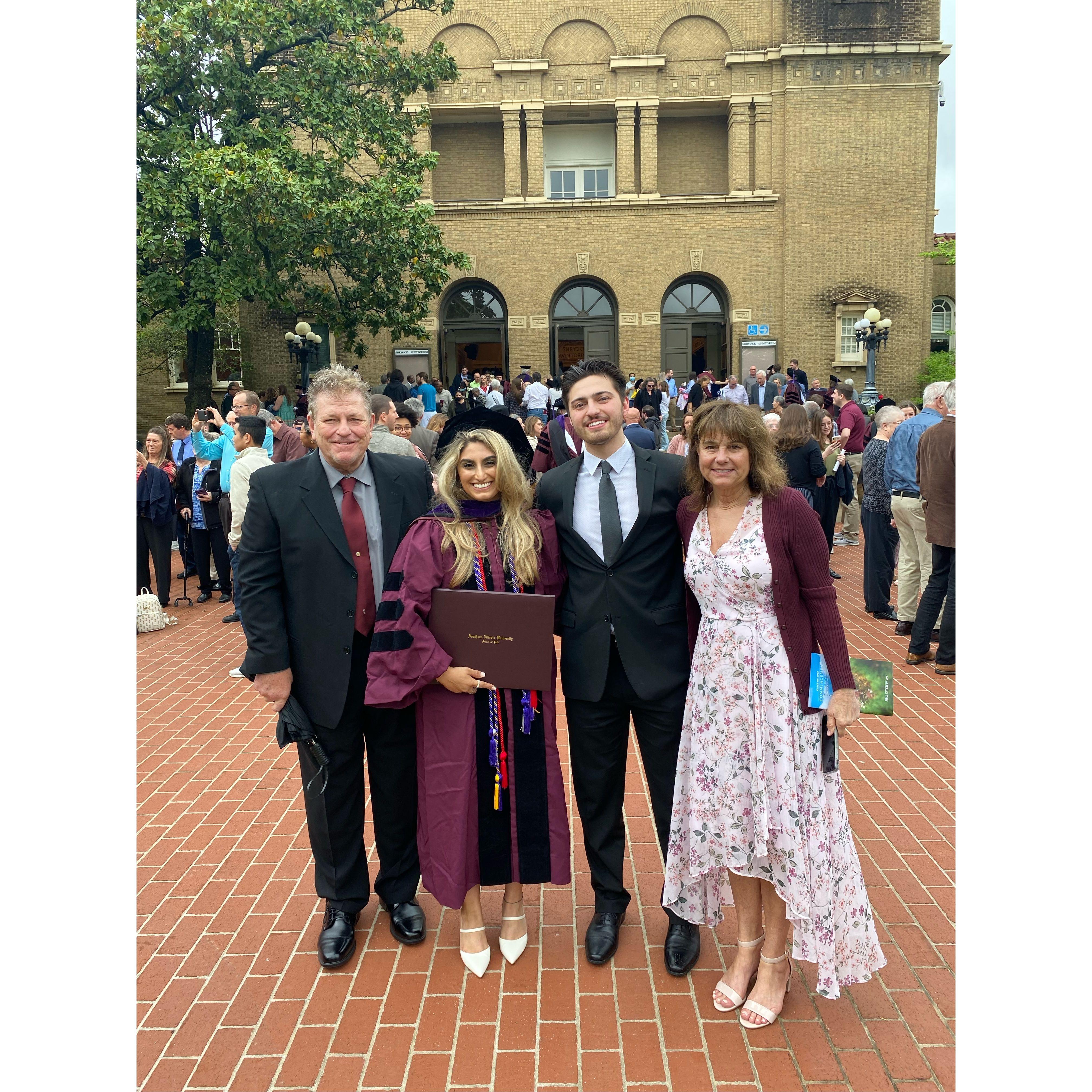 Sim's law school graduation with Brad's parents