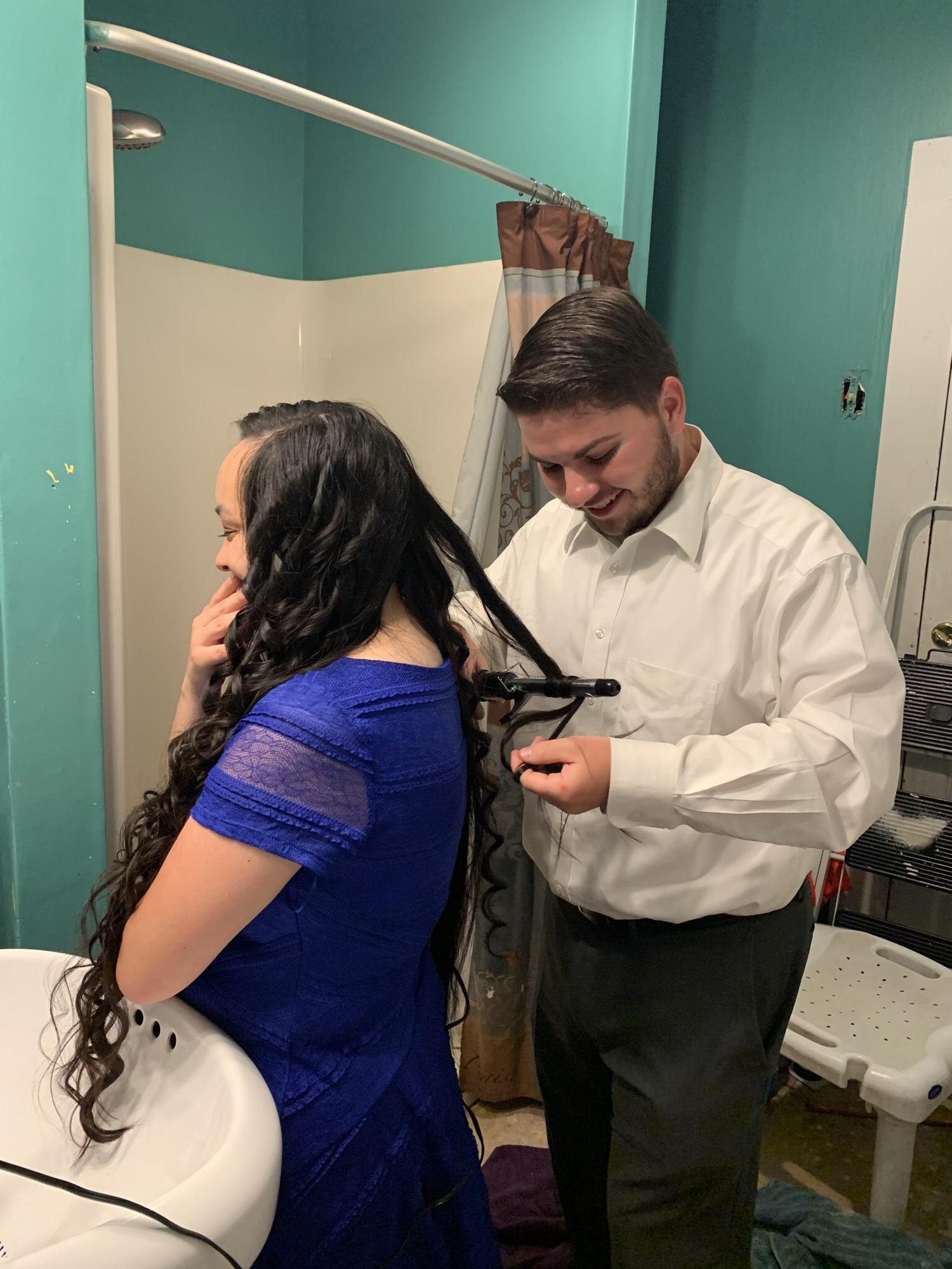 Luke is learning to curl Vivienne’s hair just before her graduation.
June 20, 2021