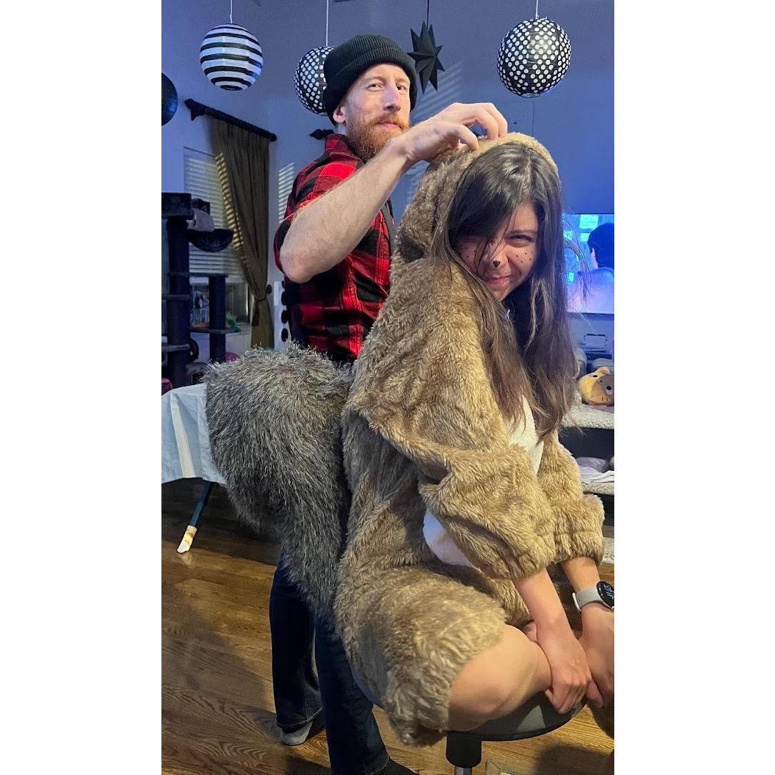 Just a lumberjack with his squirrel-friend.
