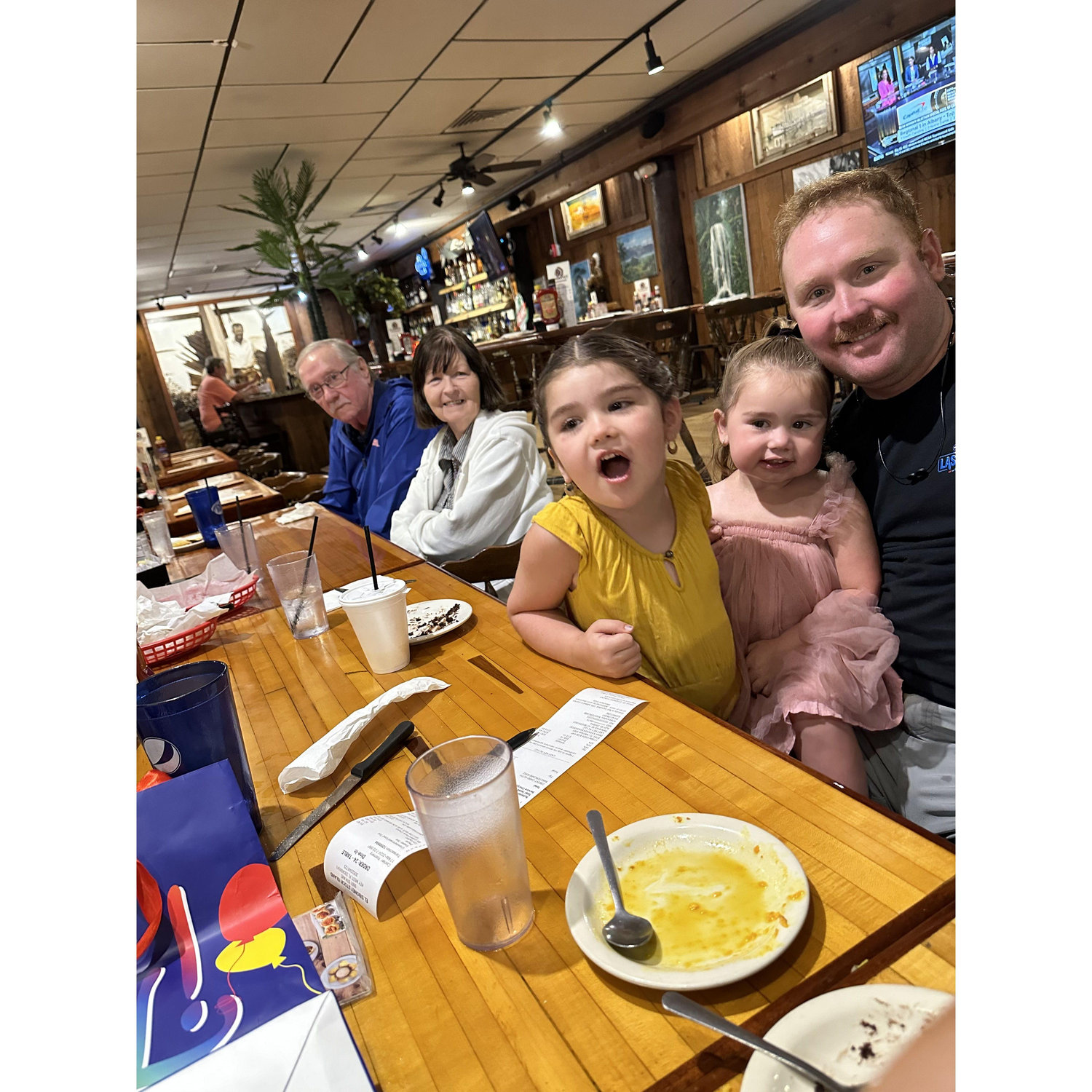 Kevin's nieces and grandparents at El Siboney, the traditional birthday spot