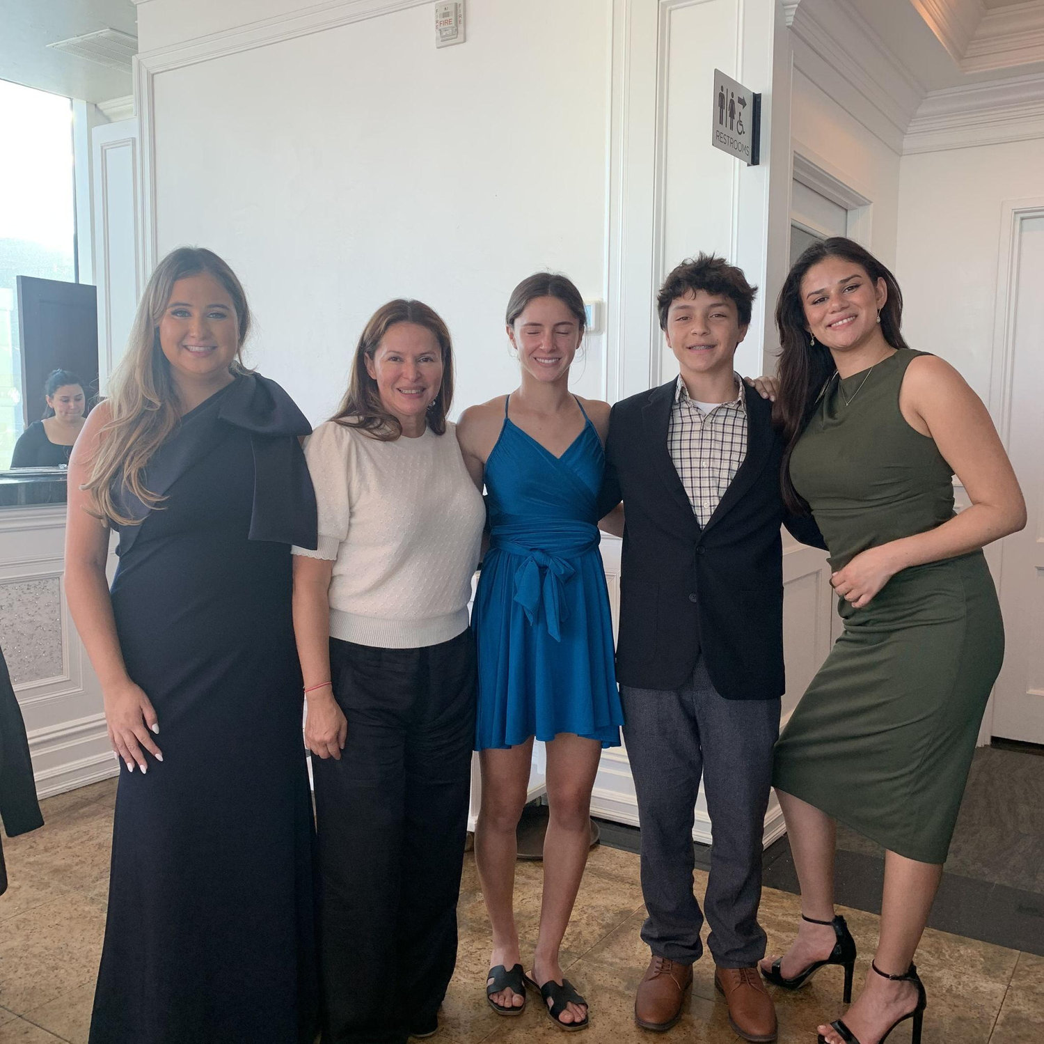 Nathalie with her mom's sister (aunt) and cousins.