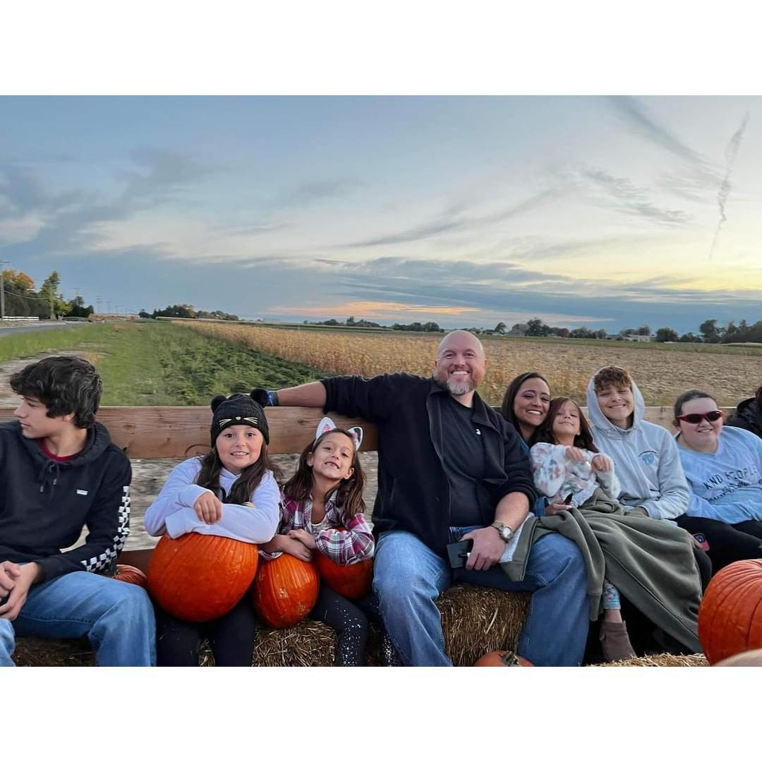 Bruh, it's a family photo on a hayride.