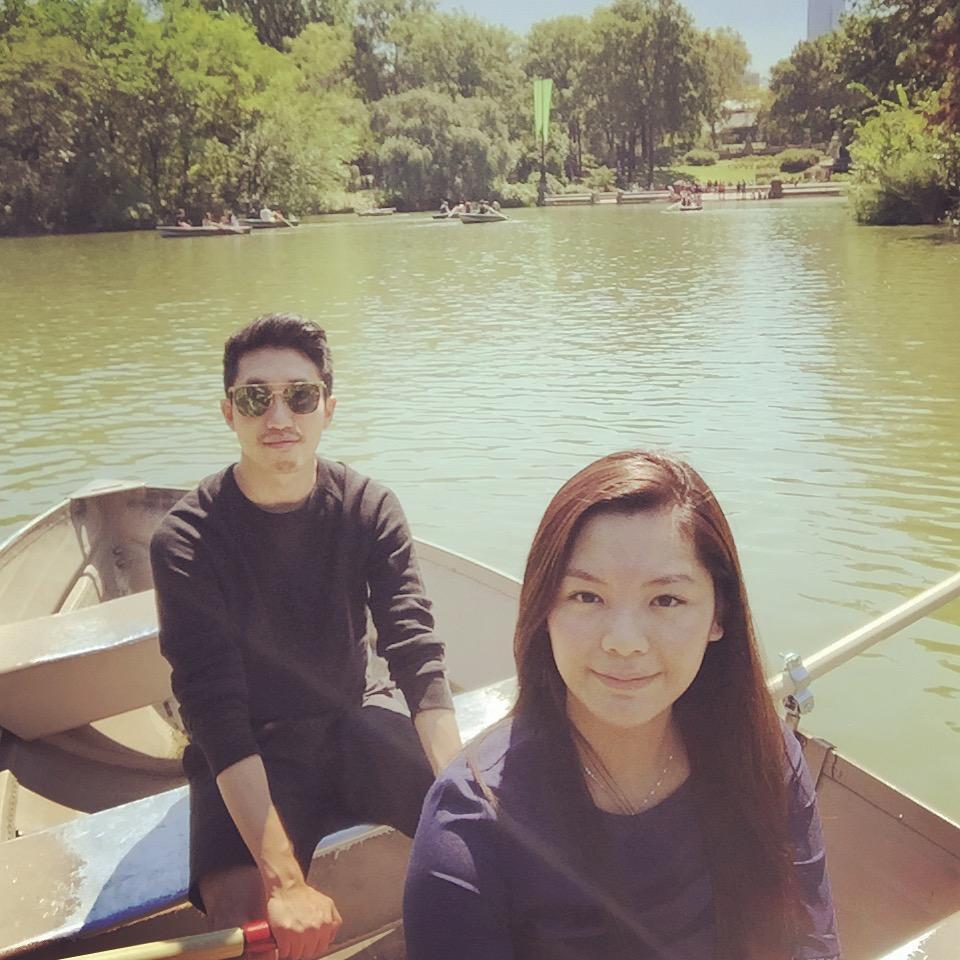 Chloe with her boat chauffeur rowing across Central Park.