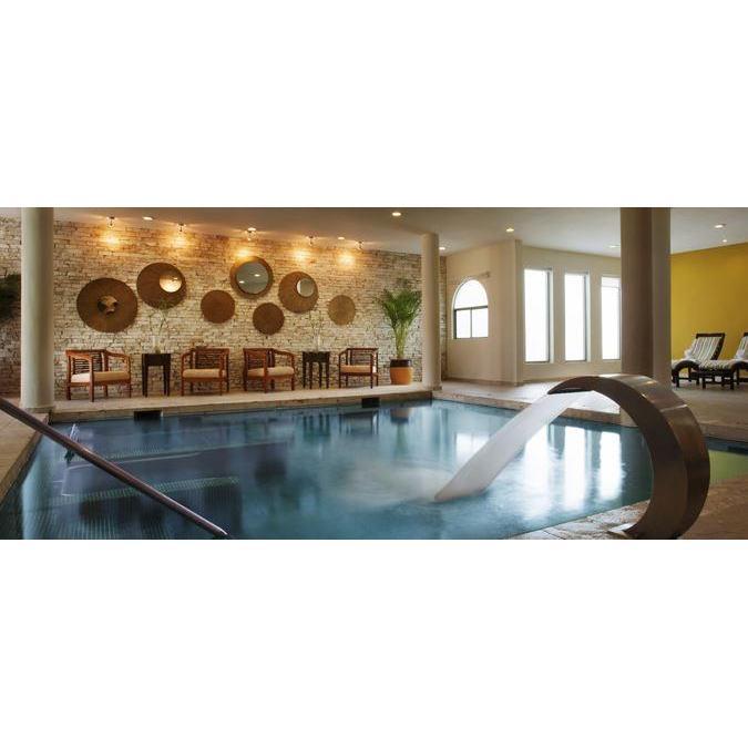 The awesome room at the spa before your massage where there are different water features to massage you as well!