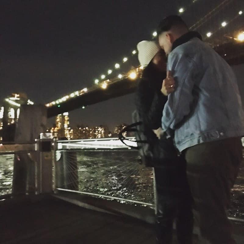 Friends captured this moment right after Warren proposed under the Brooklyn bridge.