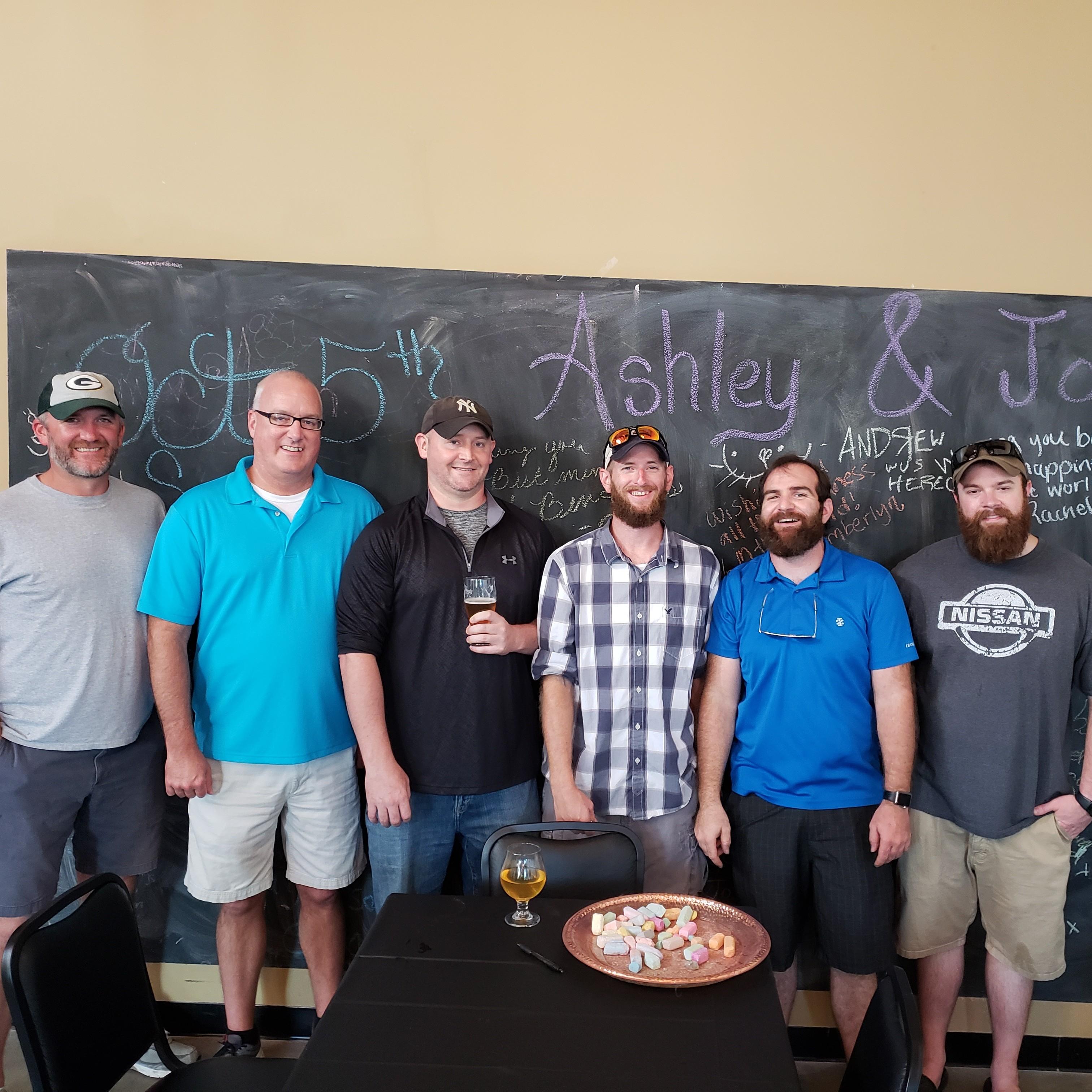 The Groom with a couple of his groomsmen and ushers!