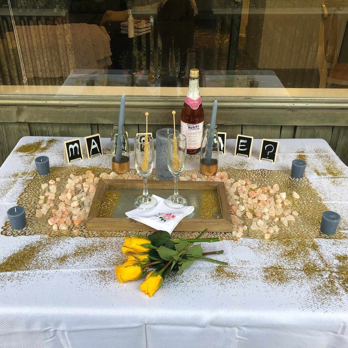 A "Will You Marry Me?" display with "It's Been A Long Long Time" by Kitty Kallen playing in the background.