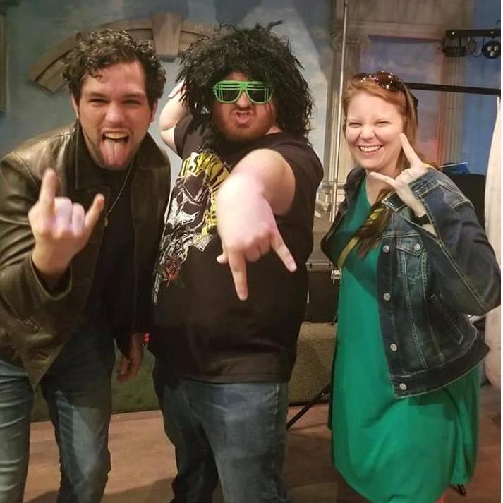 Us hard rockers need to stick together...haha!

We were cutting loose at a 80's-themed Murder Mystery dinner in Baltimore, with the main character-actor front and center!