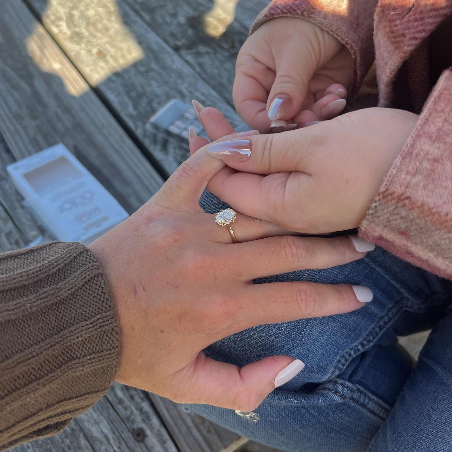 My two best friends were very involved in Carter's proposal. Olivia took all of our pictures, and Becca brought along fake nails because she knew if she asked me to get them done I'd be suspicious. -S