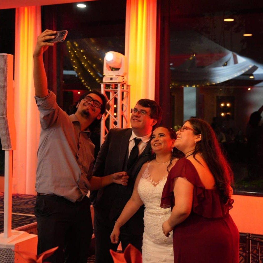 Asked to be a bridesmaid, this photo was taken by an uncle of the bride during the reception. (From left to right: Kenny, Joey, Haydee, Mary). Lauderhill, Florida. November 2022.