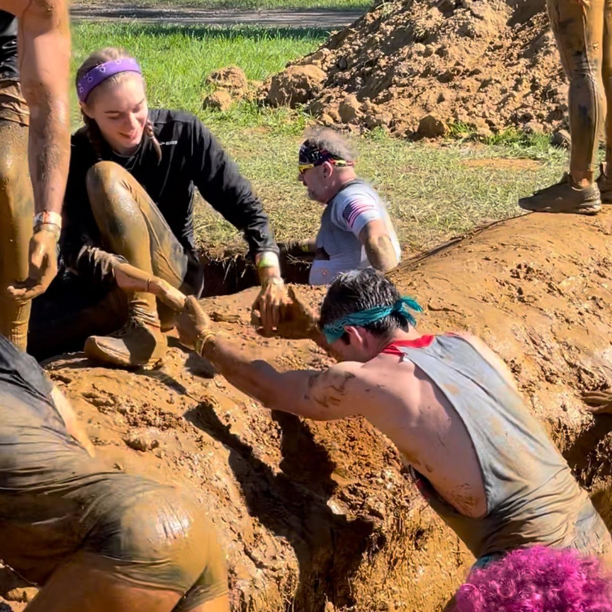2022 -  Our First Tough Mudder, when Chris would never have made it up the mud wall without Katlyn's help