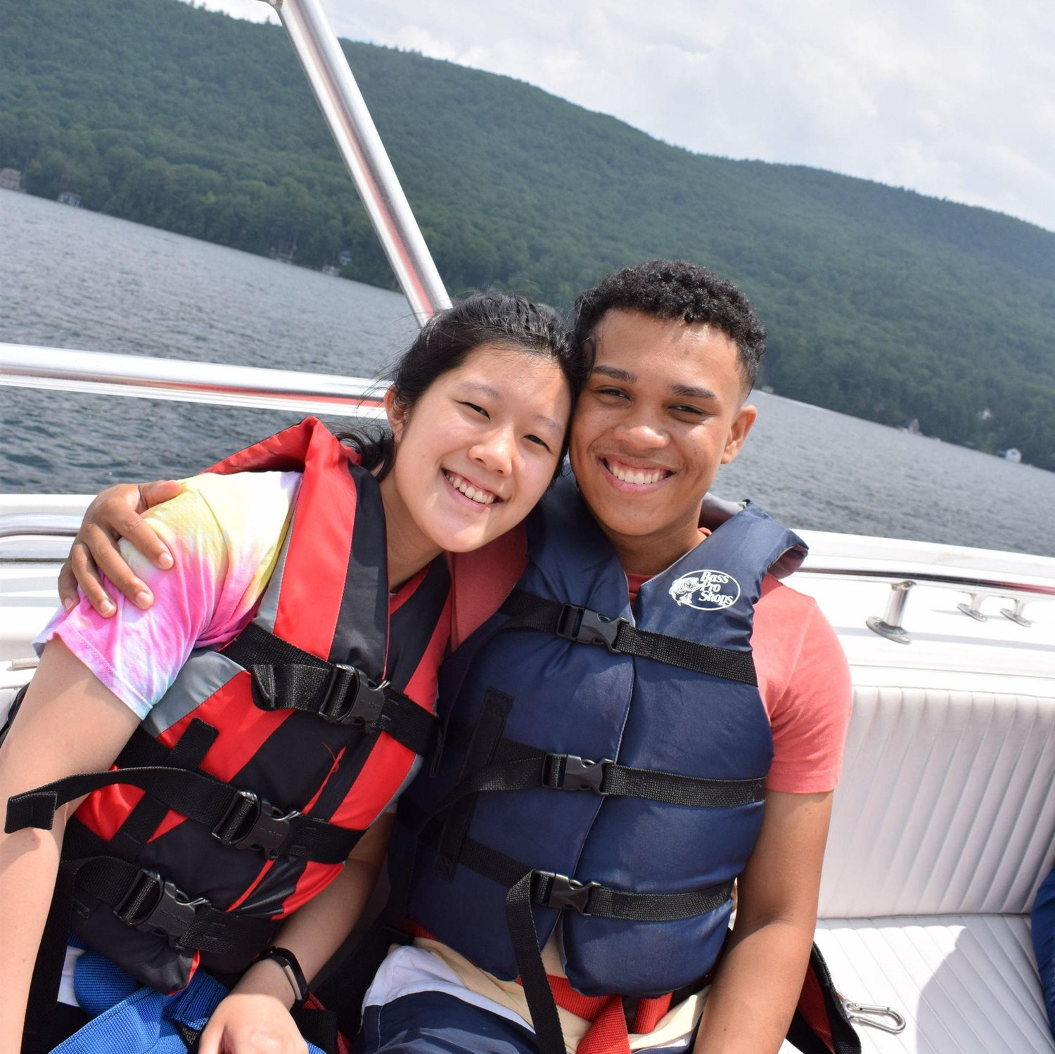 Us about to go parasailing on our first trip together to Lake George in New York!