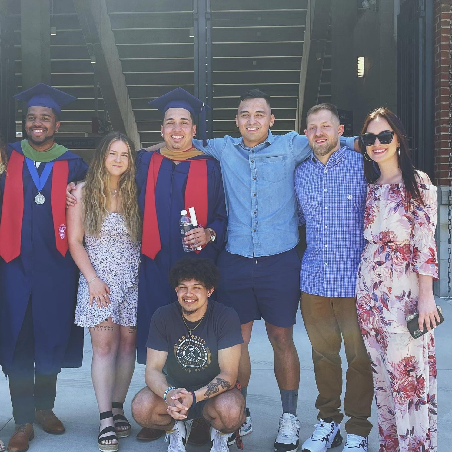 At Cameron’s Master's Degree graduation! Pictured are: Frasier, Daniel, Charlie, Emily, and at the bottom is Cameron’s brother, Matthu (all are part of our wedding party)!