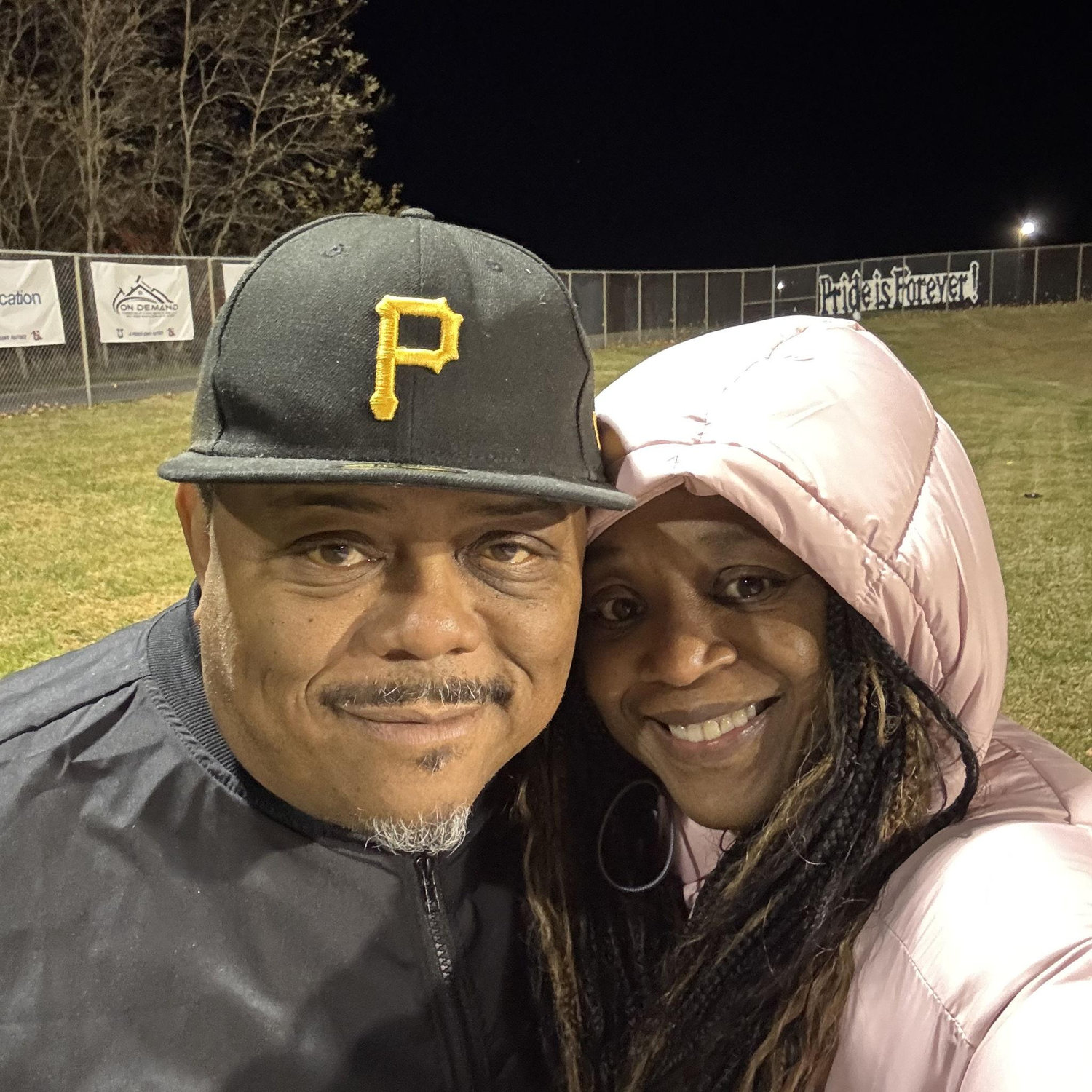 Josh's last football game of his senior year.  It was so cold that night.  One of us was dressed accordingly.