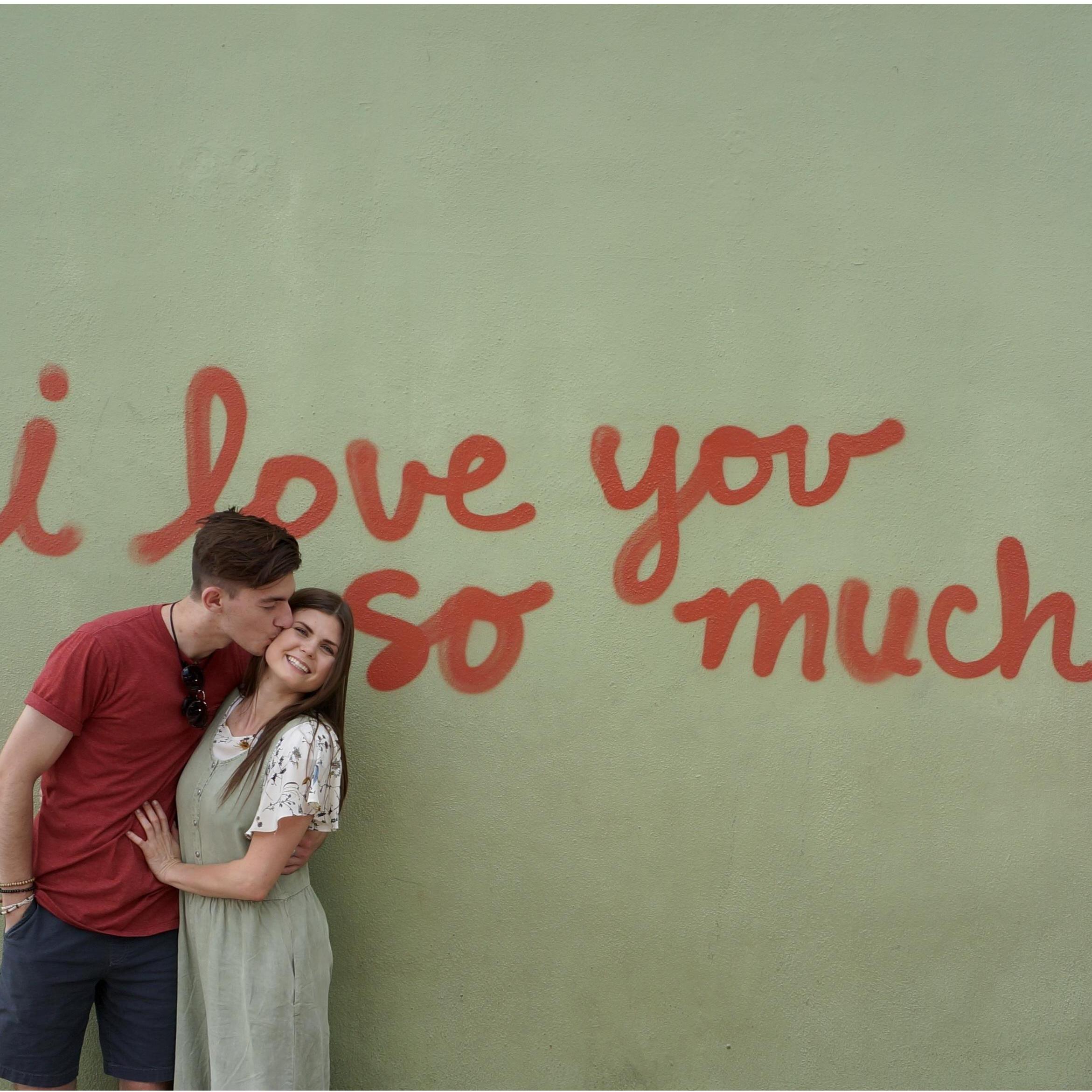 Cameron came to visit Kylee's family in Texas over the summer. This wall is notorious in downtown Austin.