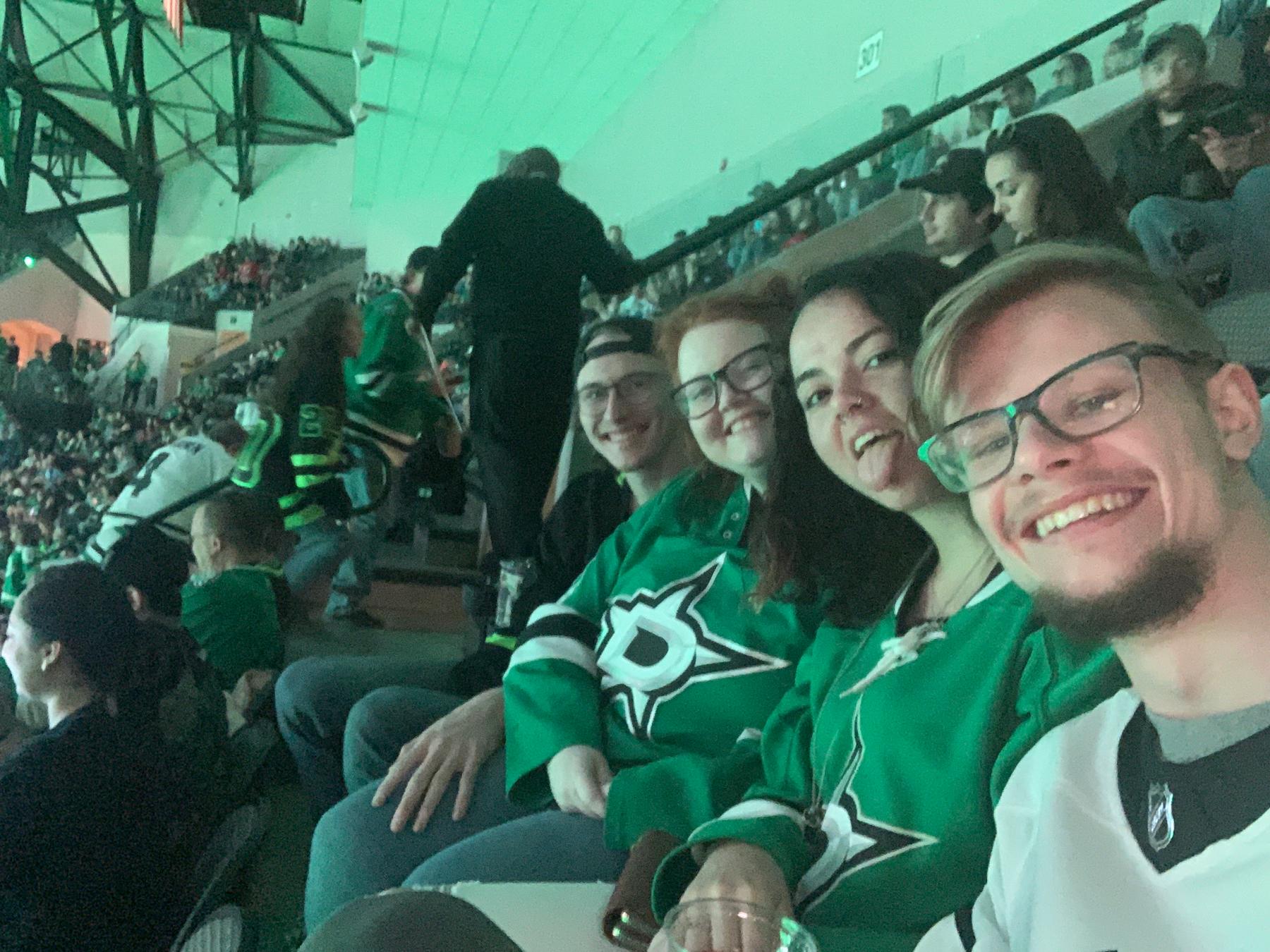 At a Dallas Stars Hockey game with friends
