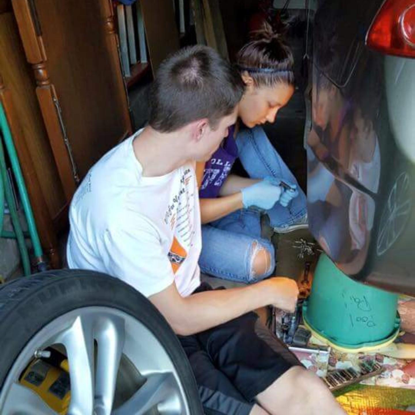 Working on Alex's car together