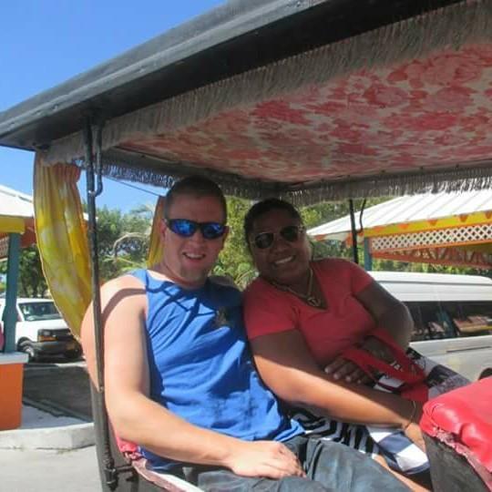 On a horse drawn carriage in the Bahamas