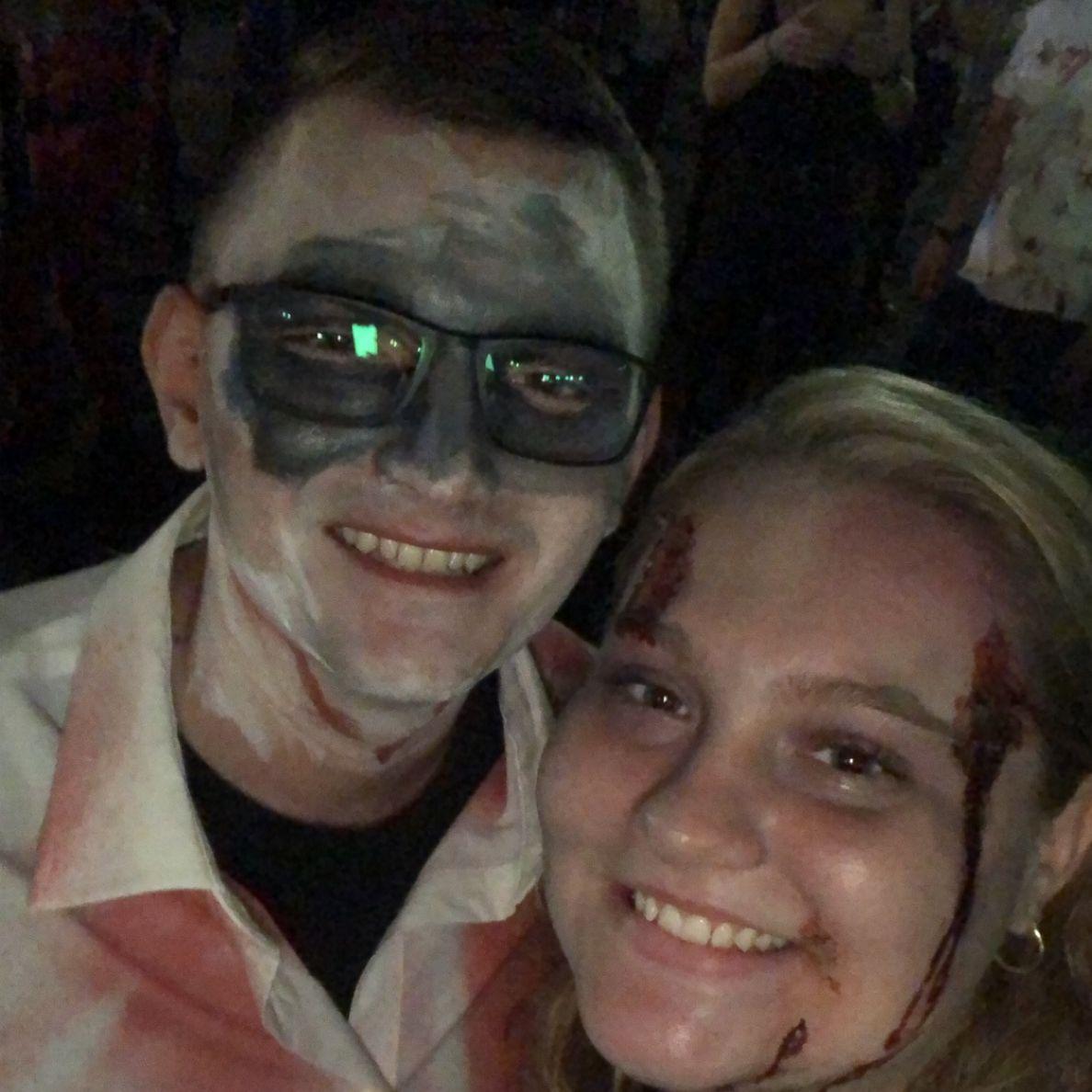 This was our very first photo together! It was taken on our second date at the Adams Street Zombie Crawl.