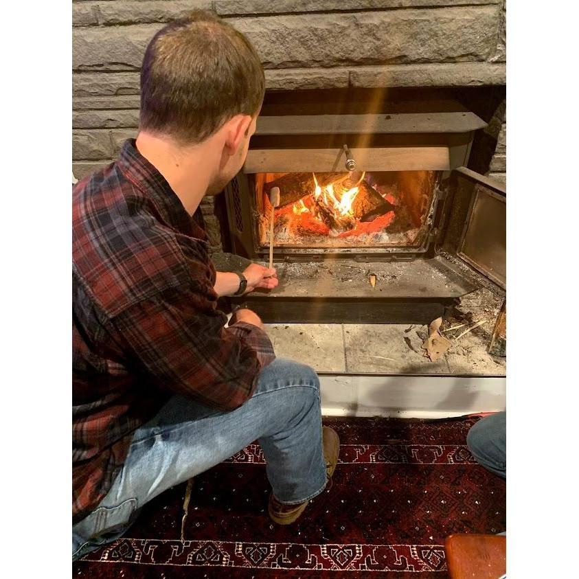 Roasting marshmallows in our woodstove.