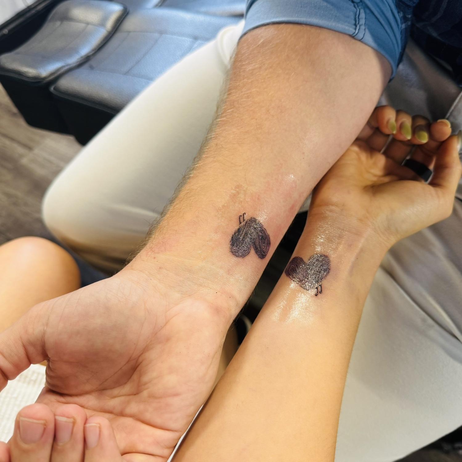 🫆 First Couple Tattoo: A little piece of us—fingerprints and initials