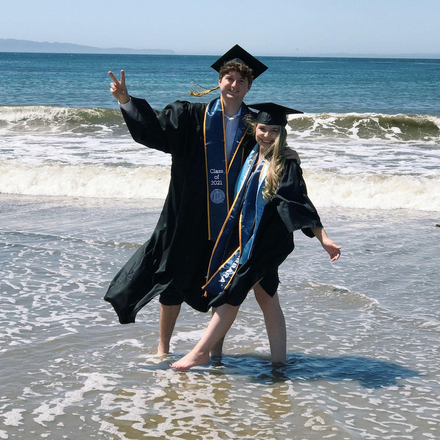 2021 - we ran straight to the ocean after walking for our UCSB graduation