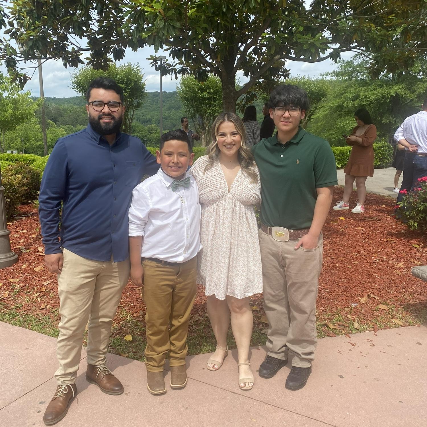 Our growing family ft. my Godson Darian