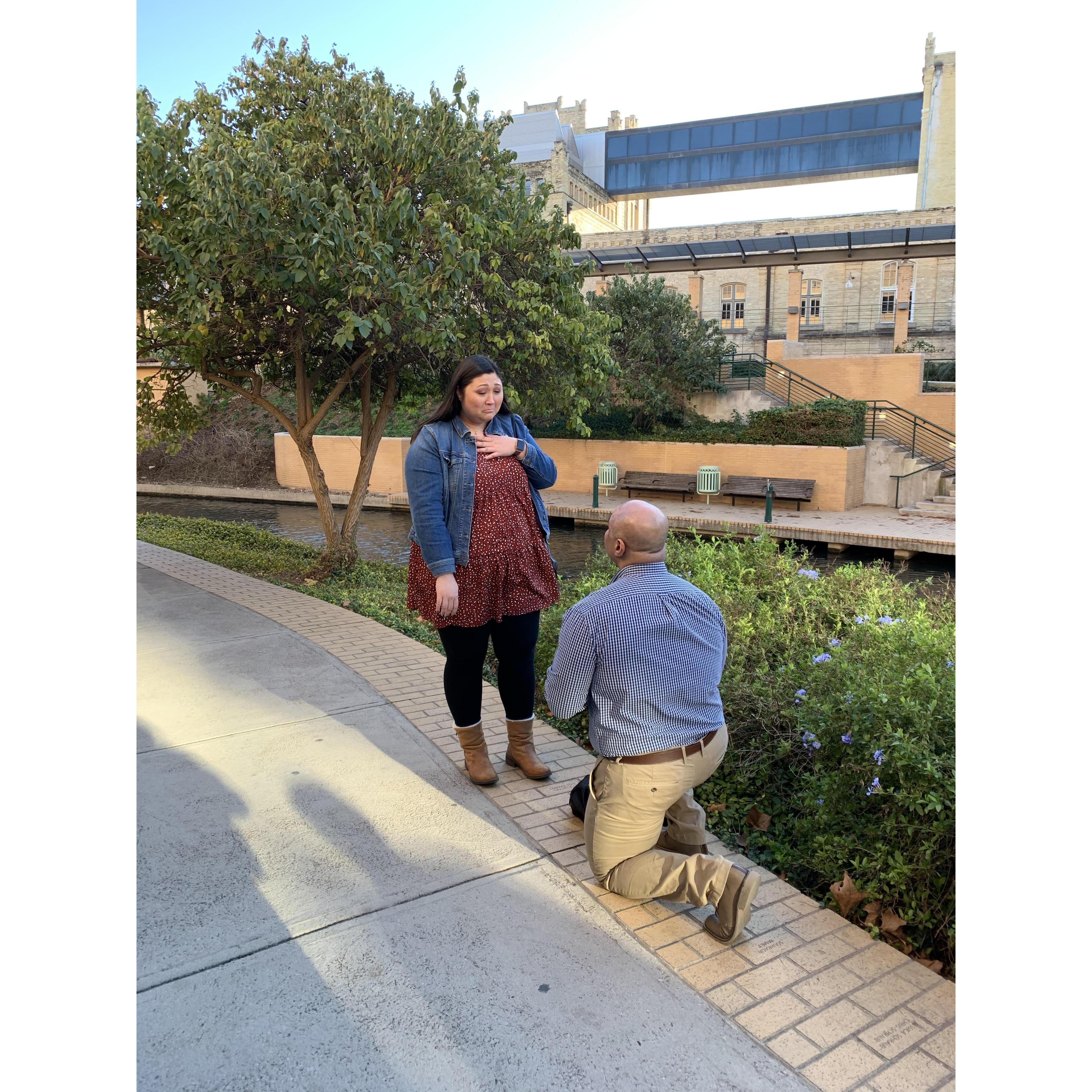 Kamran proposing to Sarah at the San Antonio Riverwalk.