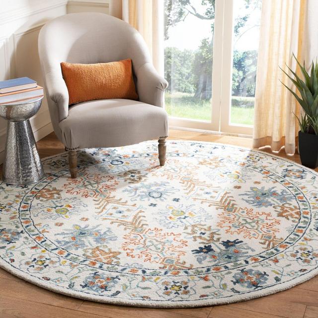Vahakn Ivory/Blue/Orange/Green Area Rug