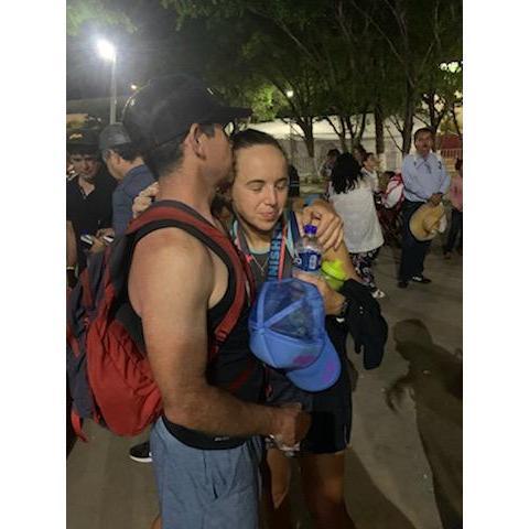 Moments after Jenny finished her first Ironman in Cozumel, coach Matt there to support her as always.