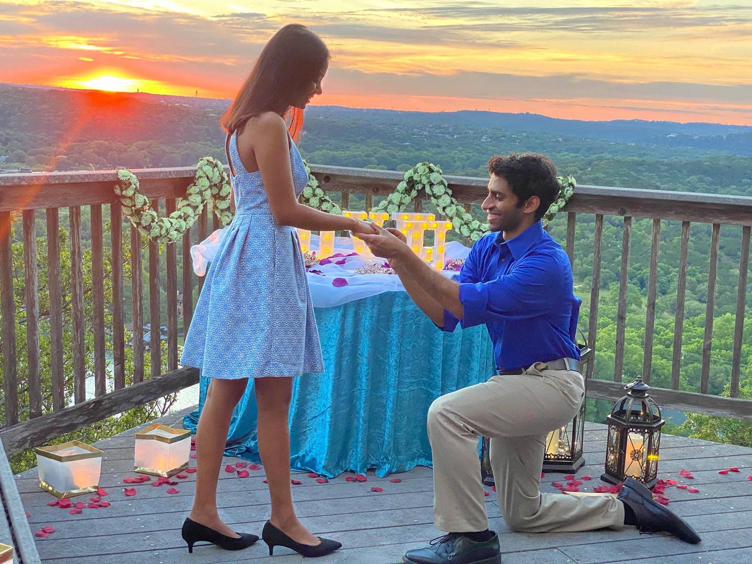 Avi popped the question in a cute, intimate setting in his backyard in Austin. Avi was so nervous that he put the ring on the wrong hand!