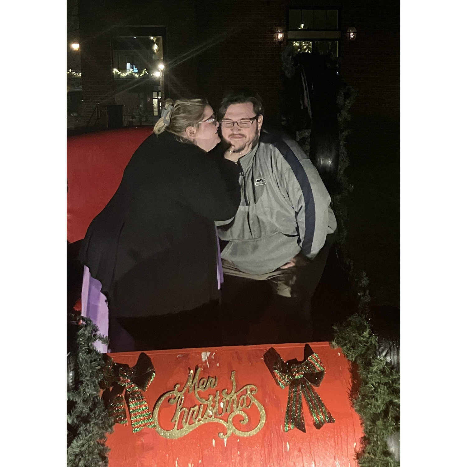 Christmas starts early these days, so the couple took a few pictures in this Christmas sleigh to commemorate the start of their first Christmas season while dating.