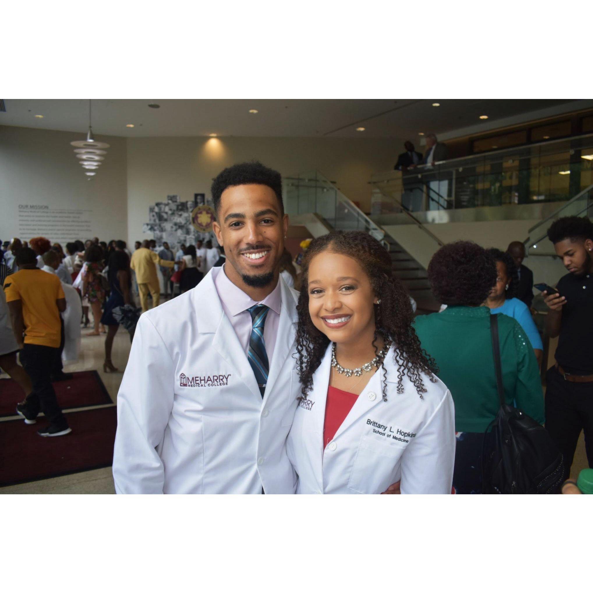 A throwback to both our white coat ceremony, the beginning of both medical school and our relationship, and Paris's hightop fade.