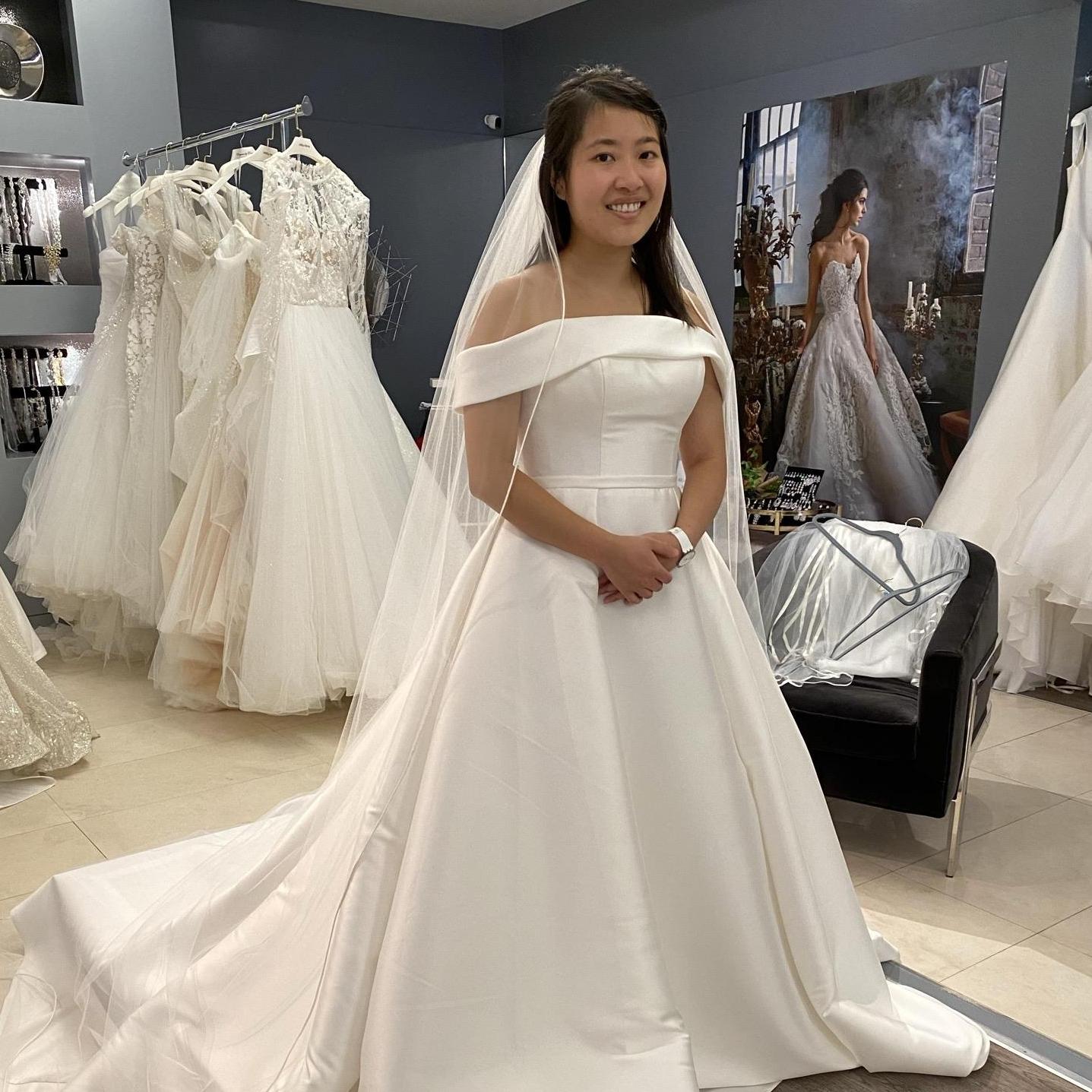 We then began the arduous process of wedding dress shopping. (This isn't my dress haha). I think went to 12 boutiques and tried on around 50 wedding dresses