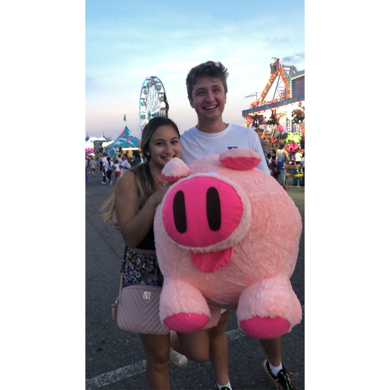 Jacob won this piggy and is still here to this day. Christina's nieces and nephew love on this piggy and one day Christina and Jacob's kids will one day too. :)